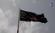 پرچم عزای امام حسین(ع) در بوستان المهدی افراشته شد