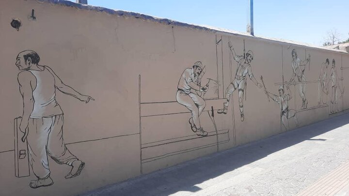 ترسیم ۳۰۷ متر مربع نقاشی دیواری از کارگران در خیابان کارگر