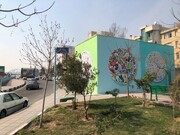 ۱۲۰۰ مترمربع از دیواره های بزرگراه سردار شهید سلیمانی با رنگهای شاد مزین شد/ چهره شاداب شهر با نقاشی‌های دیواری