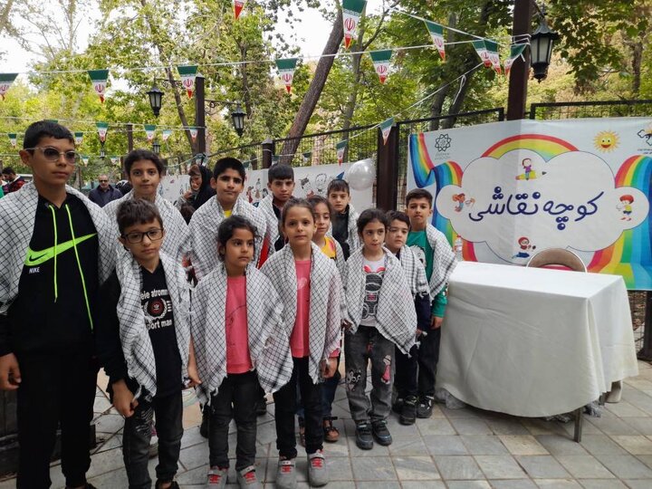 همدلی کودکان منطقه۲ در حمایت از کودکان غزه در دهکده کودکی