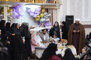 برگزاری مراسم عقد یک زوج جوان منطقه ۱۴ در جمع مادران شهید