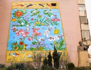 دیوارنگاره خیابان بهشتی رنگ "گل و پرنده" ایرانی گرفت