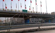 فضاسازی شهر با آذین‌بندی و اهتزاز پرچم ایران اسلامی در منطقه ۲۰