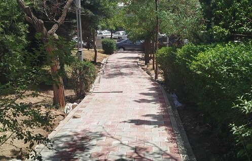 مرمت و بهسازی کفپوش و جدول در بوستان بهمنی‌نژاد