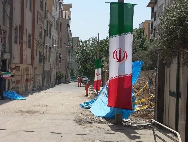 نصب پرچم ایران بر ساختمان‌های هدف حمله در منطقه ۱۳