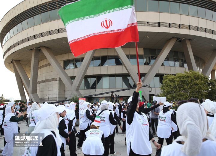 طنین صدای ورزشکاران با نوای  "ای ایران" در برج میلاد پیچید