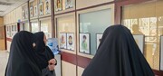 برپایی نمایشگاه عکس کودکان شهید جنگ ۱۲ روزه در سازمان خدمات و مشارکت‌های اجتماعی