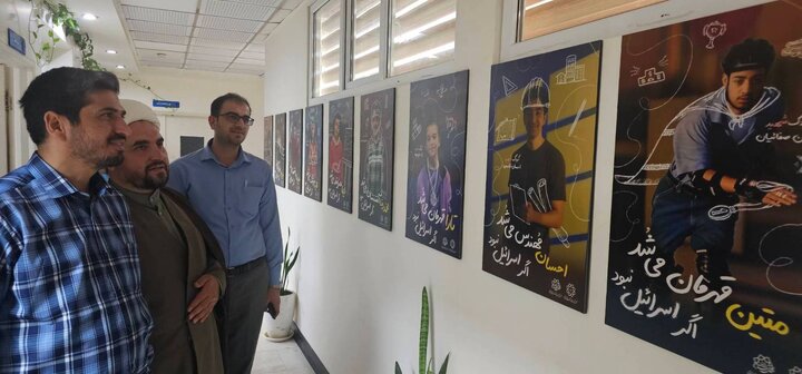 برپایی نمایشگاه عکس کودکان شهید جنگ ۱۲ روزه در سازمان خدمات و مشارکت‌های اجتماعی