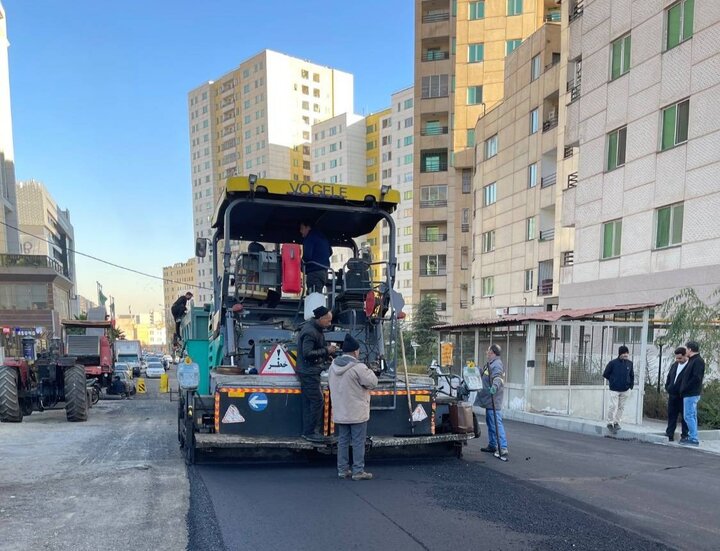 نوسازی و روکش مکانیزه آسفالت معبر نیما یوشیج در منطقه ۲۲