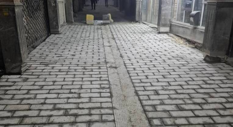 اجرای سنگفرش ۸۰۰ مترمربعی با هدف وحدت بصری و رونق تجاری