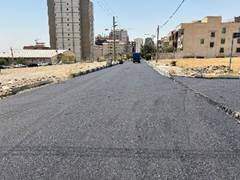 اجرای عملیات آسفالت خیابان میلاد یکم در شهرک گلستان منطقه ۲۲